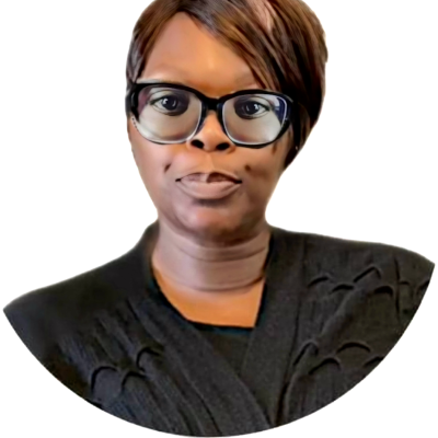 A photo of a medium dark skin tone woman with a warm smile